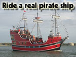 Clearwater pirate ship crusies near vacation beach houses in Clearwater